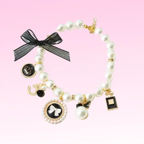Necklaces by Bark 5th Ave Faire Pearls and Bow Charm Necklace 